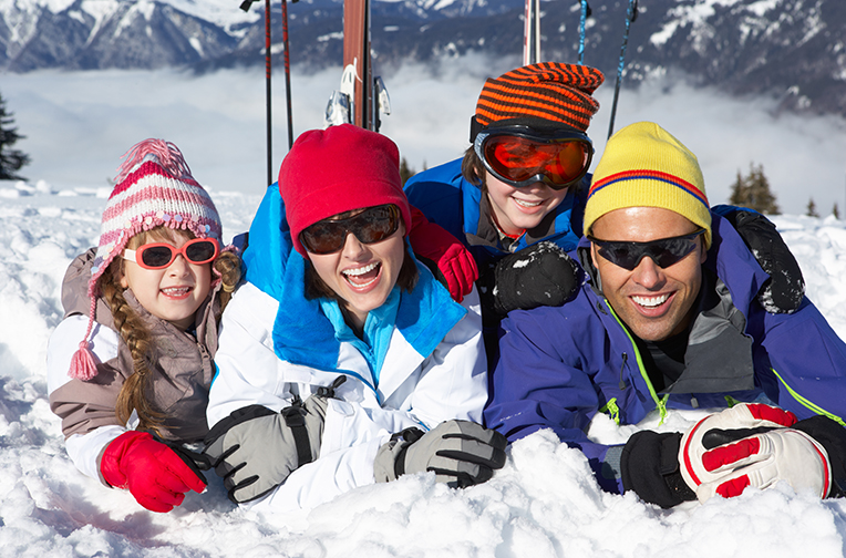 Family having fun in the snow